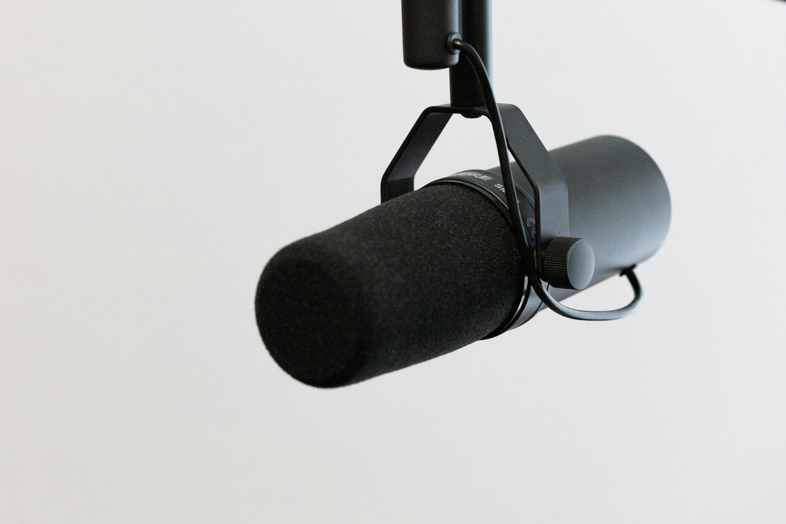 black microphone on white background